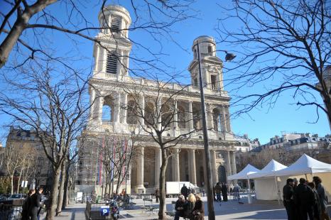People stroll in front of the Saint Sulpice church on January 16, 2011 in Paris. The northern...