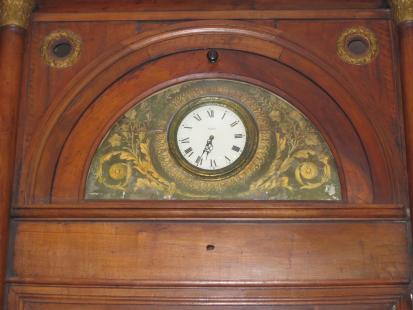 Boiseries avec horloge à la pharmacie des Carmes